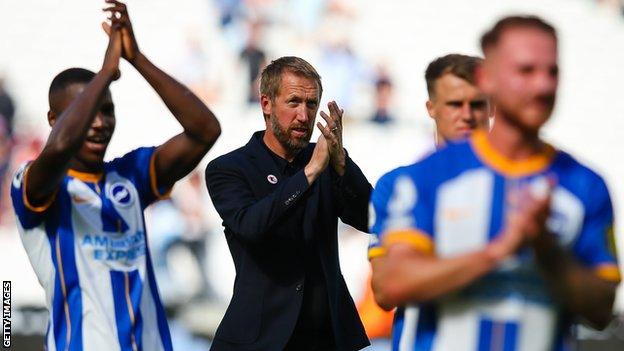 Graham Potter with Brighton players