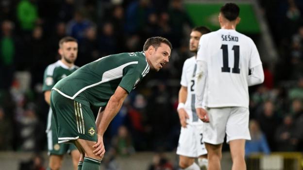 Dejection for Northern Ireland captain after the defeat by Slovenia in Belfast