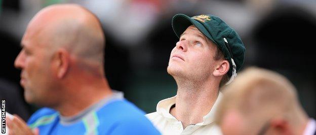 Australia captain Steve Smith looks to the sky