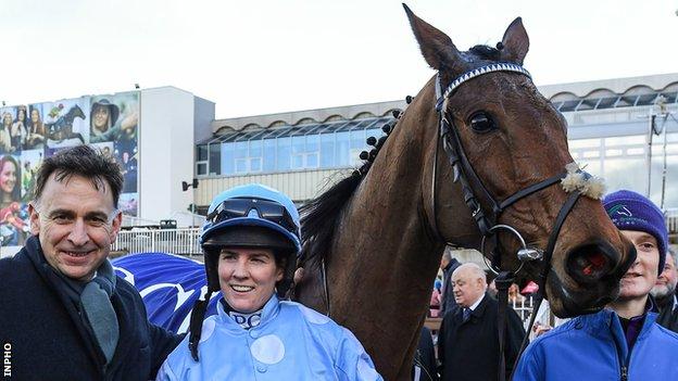 Rachael Blackmore with trainer Henry de Bromhead after Honeysuckle's Irish Champion Hurdle win at Leopardstown