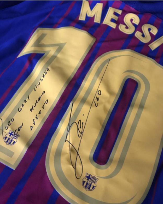 The signed Messi shirt that Fabregas presented to Lineker