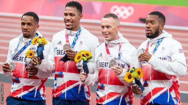 CJ Ujah, Zharnel Hughes, Richard Kilty and Nethaneel Mitchell-Blake receive their Olympic silver medal