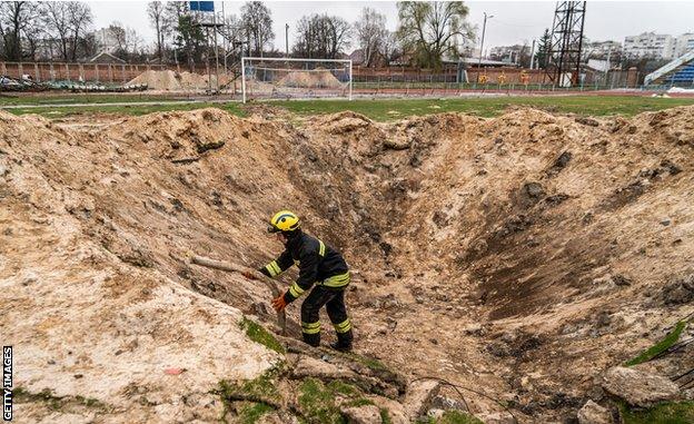 A crater from an artillery or missile strike in the middles of Desna's pitch