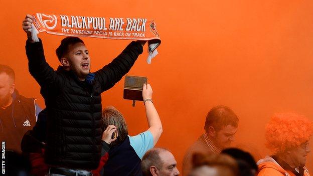 Blackpool supporters tangerine flare