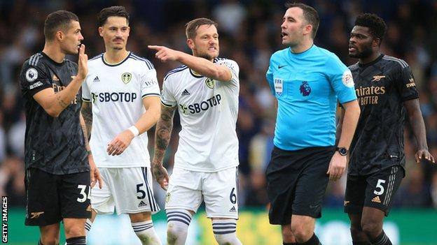 Referee Chris Kavanagh endured the ire of both teams in Leeds' defeat by Arsenal at Elland Road.
