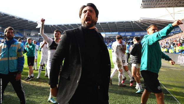 Russell Martin celebrates Swansea City's derby win at Cardiff City last season