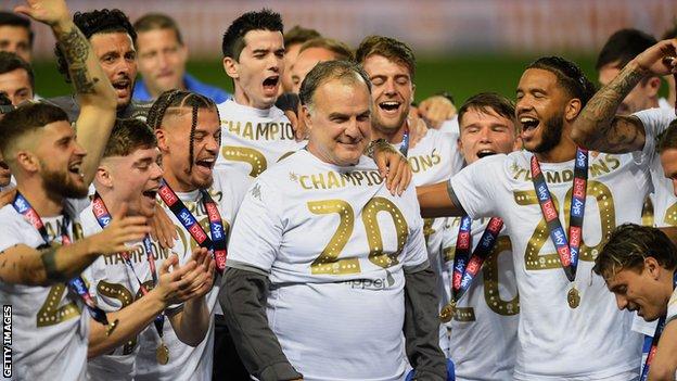 Marcelo Bielsa and Leeds players celebrate winning the 2019-20 Championship title