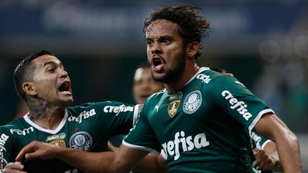 Gustavo Scarpa celebrates a goal with Palmeiras team-mate Dudu