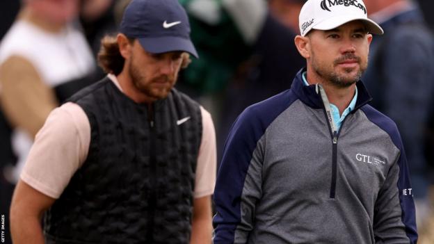 Tommy Fleetwood and Brian Harman walking unneurotic  astatine  The Open