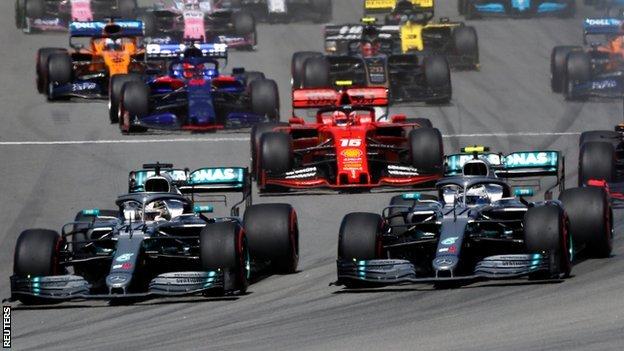 Lewis Hamilton takes the lead over Valtteri Bottas from the start of the Spanish Grand Prix