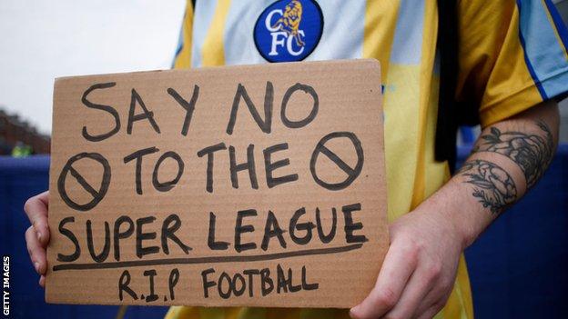 A Chelsea fan protests outside Stamford Bridge