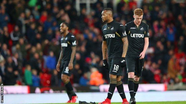 Swansea's players at the final whistle