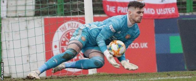 Edwards saved two penalties in Portadown's shootout exit to Glentoran in the Irish Cup, his final game for the club