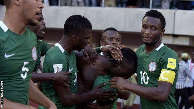 Nigeria players celebrate during the victory over Algeria
