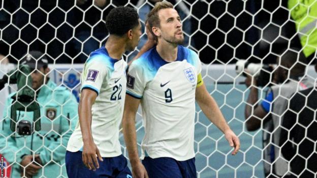 Harry Kane is consoled after missing a penalty against France at last year's World Cup