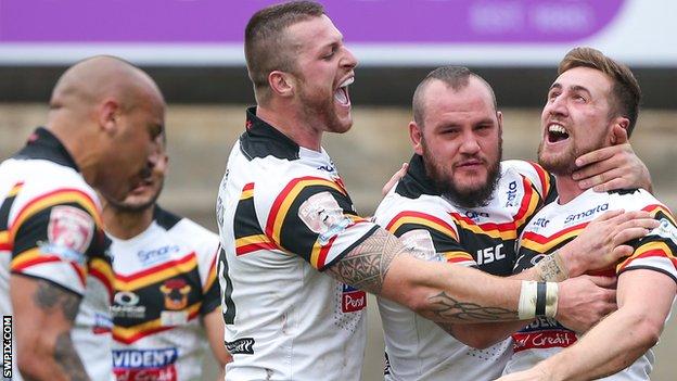 Bradford Bulls celebrate James Clare's try against Salford