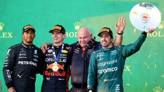 Fernando Alonso joins Lewis Hamilton and Max Verstappen on the podium at the Australian Grand Prix
