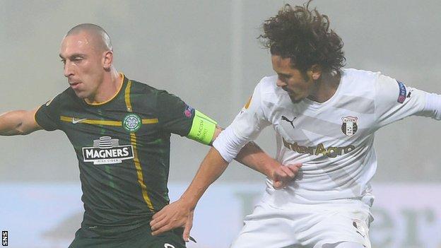 Celtic's Scott Brown and Astra's George Florescu