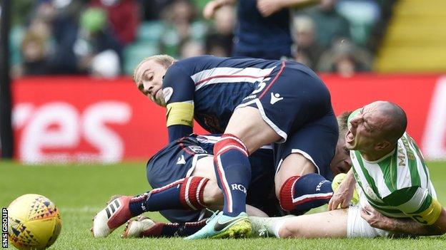 Ross County's Andrew Davies was sent off for a stamp on Scott Brown