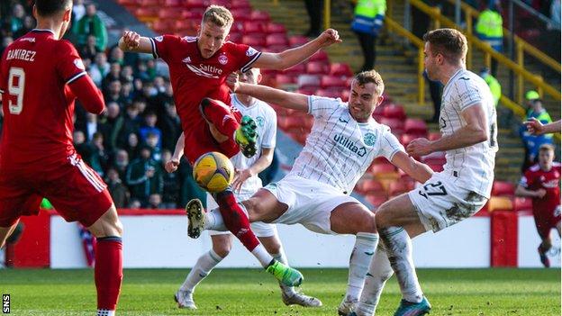 Ryan Porteous fouls Ross McCrorie