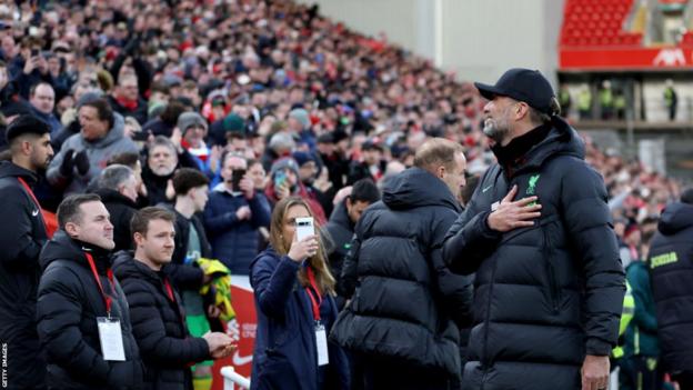 Jurgen Klopp gestures to Liverpool supporters prior to the Reds' FA Cup tie at home to Norwich