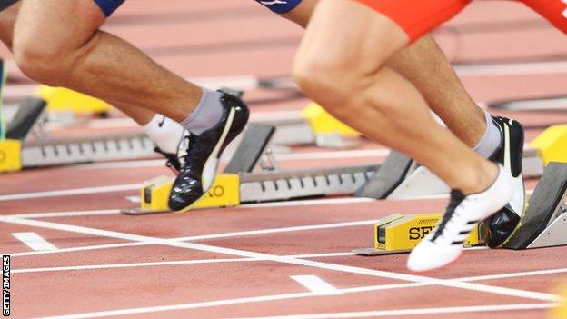 Athlete in starting blocks