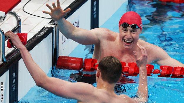 Tom Dean and Duncan Scott celebrate at the Tokyo Olympics