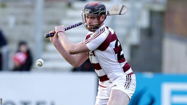 Jerome McGuigan scores a goal