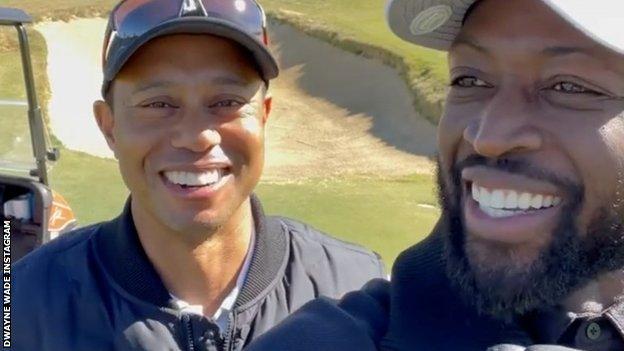 Tiger Woods (à gauche) et Dwayne Wade