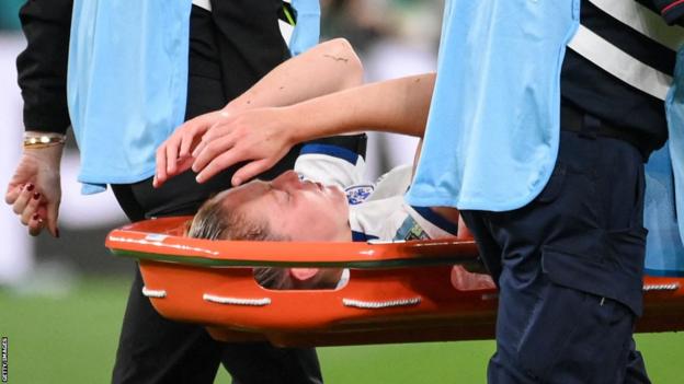 Keira Walsh is taken off on a stretcher in the game against Denmark