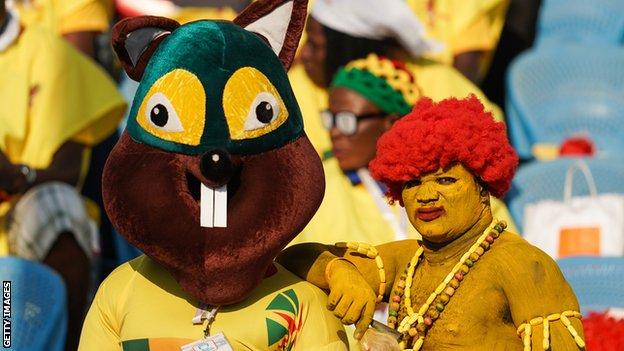 A Benin fan in a squirrel costume