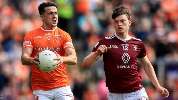 Armagh's Stefan Campbell attempts to burst away from Westmeath's Senan Baker at the Athletic Grounds