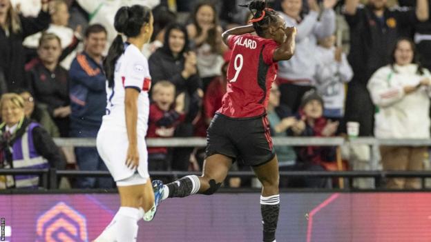 Melvine Malard celebrates scoring for Manchester United