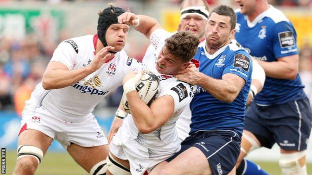 Chris Henry and Sean Reidy in action against Rob Kearney