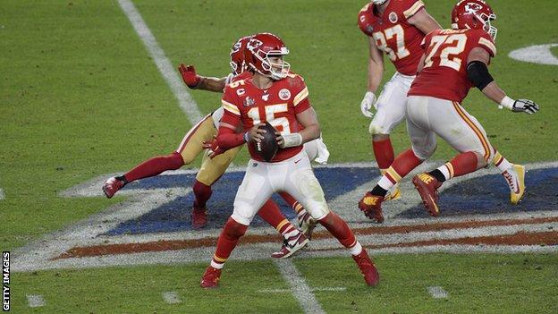 Kansas City Chiefs' Patrick Mahomes prepares to throw the ball