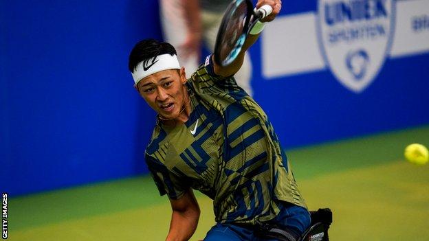 Japanese wheelchair tennis player Tokito Oda plays a shot