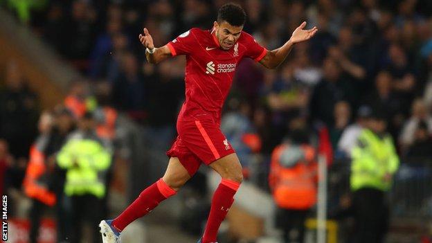 Luis Diaz celebrating with fans after scoring against Tottenham