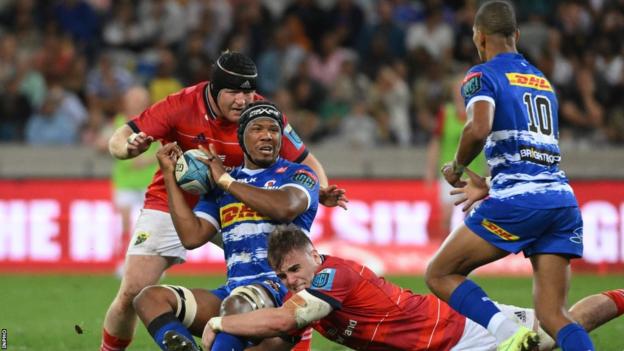 Munster's Alex Kendellen tackles Marvin Orie in last month's game in Cape Town