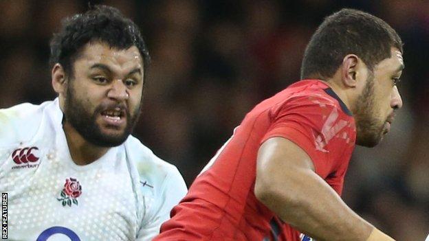 Billy Vunipola chases Taulupe Faletau during the 2015 Six Nations