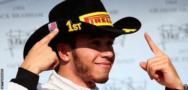 Lewis Hamilton celebrates winning the 2012 United States Grand Prix