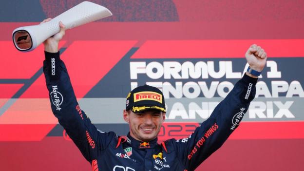 Max Verstappen celebrates winning the Japanese Grand Prix