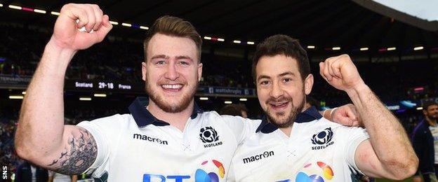 Scotland's Stuart Hogg, left, and Greig Laidlaw after defeating France at Murrayfield