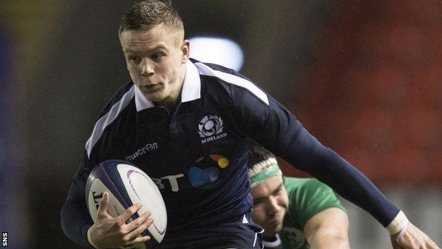 Darcy Graham carries the ball for Scotland U20s against Ireland