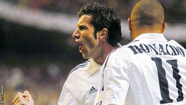 Luis Figo and Ronaldo celebrate
