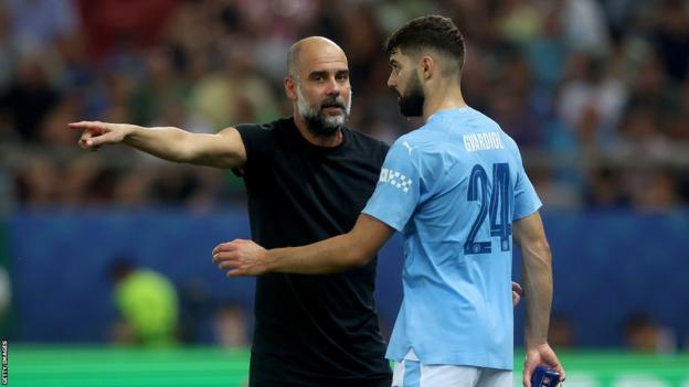 Manchester City's Pep Guardiola and new signing Josko Gvardiol