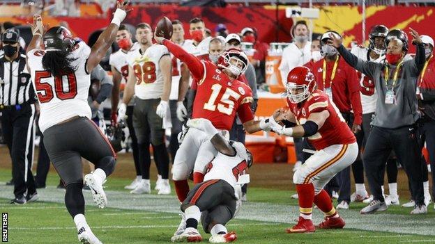 Patrick Mahomes is tackled during Super Bowl 55