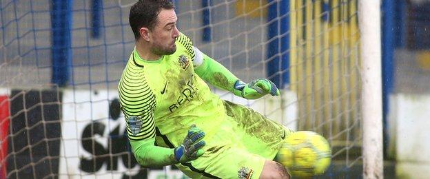 Jonathan Tuffey's outstanding display for Glenavon included this save from Ciaron Harkin's penalty
