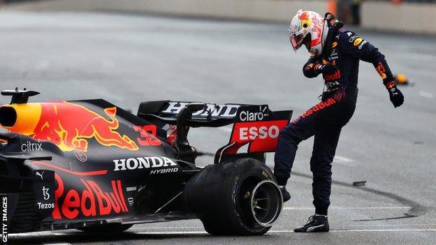 Max Verstappen kicks his left-rear tyre after crashing out in Baku
