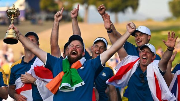 European Shane Lowry celebrates the Ryder Cup alongside Rory McIlroy (right) on Sunday