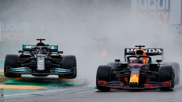 Red Bull's Max Verstappen holding off Mercedes' Lewis Hamilton during the 2021 Emilia Romagna Grand Prix